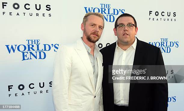 Actors Simon Pegg and Nick Frost pose on arrival for the L.A. Premiere of the film 'The World's End' in Hollywood, California, on August 21 2013. AFP...