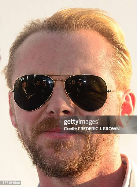 Actor Simon Pegg poses on arrival for the L.A. Premiere of the film 'The World's End' in Hollywood, California, on August 21 2013. AFP PHOTO/Frederic...