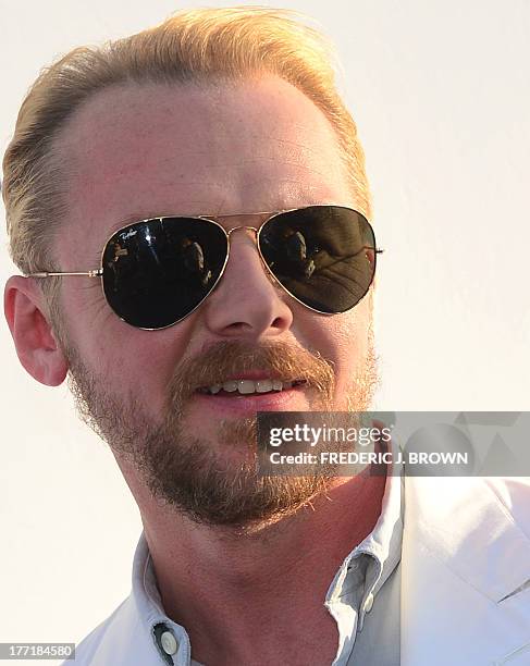 Actor Simon Pegg poses on arrival for the L.A. Premiere of the film 'The World's End' in Hollywood, California, on August 21 2013. AFP PHOTO/Frederic...