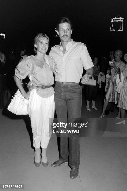 Kathryn Holcomb and Bruce Boxleitner attend a party, themed for the movie "Tron" and benefitting the California Institute of the Arts, on the Walt...