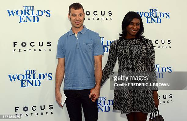 Actor Matt Stone and his wife Angela Howard pose on arrival for the L.A. Premiere of the film 'The World's End' in Hollywood, California, on August...