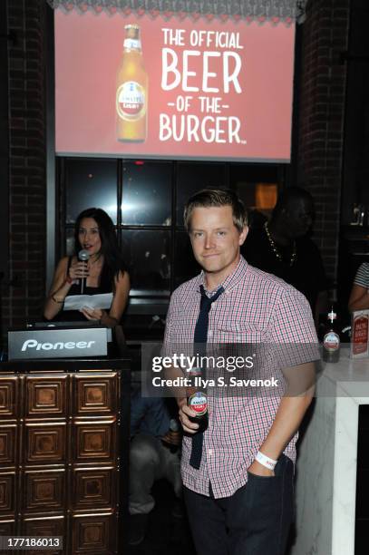 Chef Richard Blais enjoys an "Official Beer of the Burger" at Time Out New York's Battle of the Burger presented by Amstel Light.