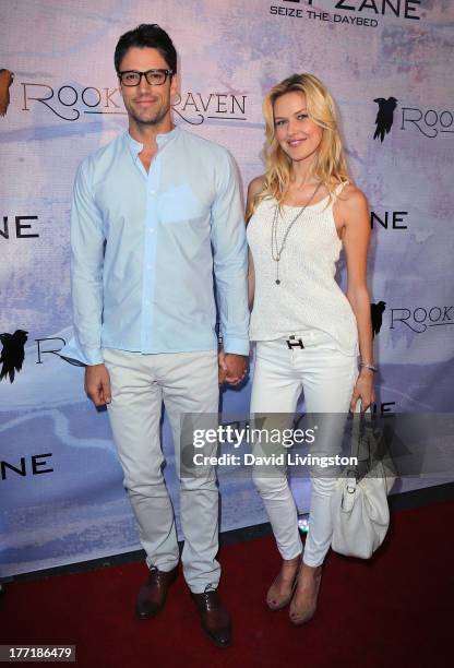 Actor James Scott and model Kaitlin Robinson attend the opening night of Billy Zane's "Seize The Day Bed" solo art exhibition at G+ Gulla Jonsdottir...