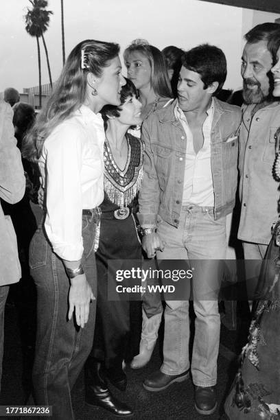 Terry McQueen, Neile Adams, Chad McQueen, and George Schlatter attend an event at the Santa Monica Civic Auditorium in Santa Monica, California, on...