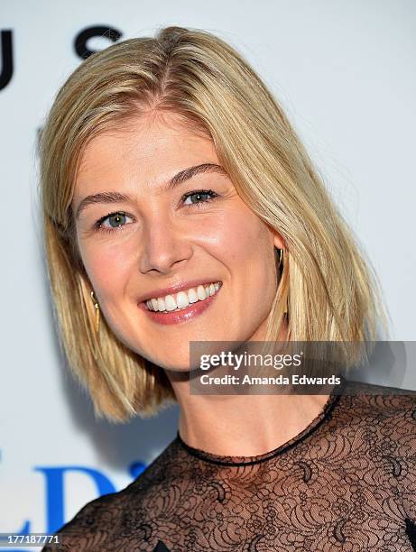 Actress Rosamund Pike arrives at the Los Angeles premiere of "The World's End" at ArcLight Cinemas Cinerama Dome on August 21, 2013 in Hollywood,...