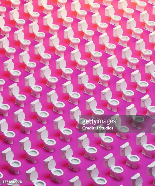 toilet grid pattern on a pink background - food borne illness stock pictures, royalty-free photos & images