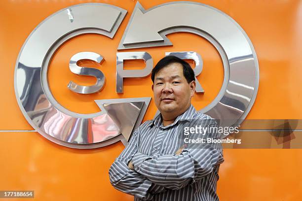 Piya Tanticachyanon, managing director of Super Rich 1965 Co., poses for a photograph at one of the company's currency exchange branches in Bangkok,...