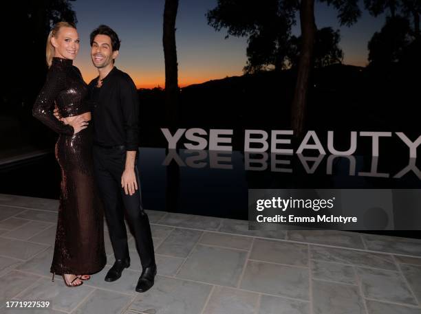 Molly Sims and Joey Maalouf attend "Celebrating the Magic and Meaning Behind YSE Beauty" on November 02, 2023 in Pacific Palisades, California.