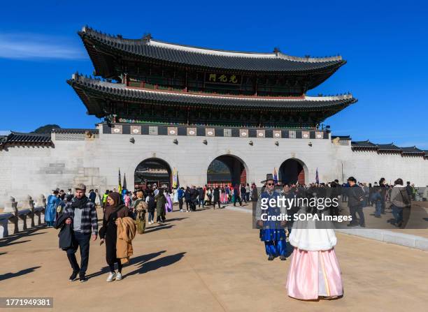 Tourists wearing Hanbok, the traditional Korean costume, visit Gyeongbokgung Palace in Seoul. Gyeongbokgung Palace was the main royal palace of the...