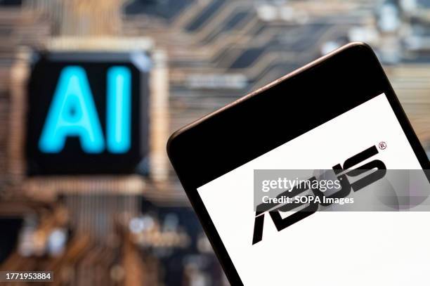 In this photo illustration, the Taiwanese multinational computer and phone hardware and electronics company Asus logo seen displayed on a smartphone...