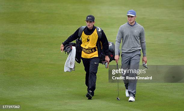 Oliver Fisher of England in action during the first round of the Johnnie Walker Championship at Gleneagles on August 22, 2013 in Auchterarder,...