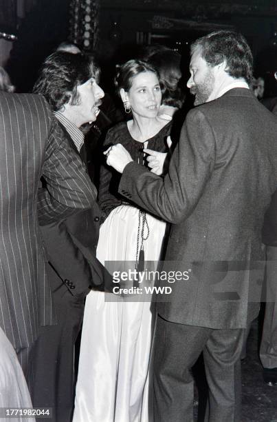 Dustin Hoffman, Anne Byrne, and Alan J. Pakula attend a party, hosted by Columbia Pictures President David Begelman and his wife, Gladyce Begelman,...