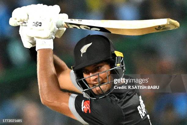 New Zealand's Rachin Ravindra reacts after playing a shot during the 2023 ICC Men's Cricket World Cup one-day international match between New Zealand...