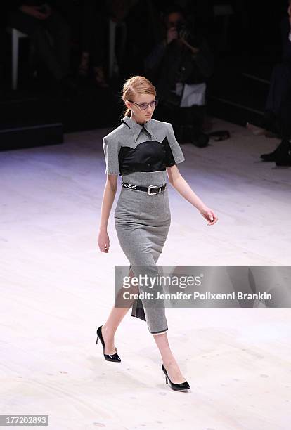 Model showcases designs by Pheonix Keating on the runway at the MBFWA Trends show during Mercedes-Benz Fashion Festival Sydney 2013 at Sydney Town...