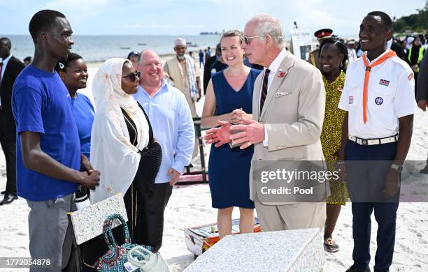 King Charles III meets members of Flipflopi, a movement which aims to end single use plastic, transforming and upcycling litter to preserve the...