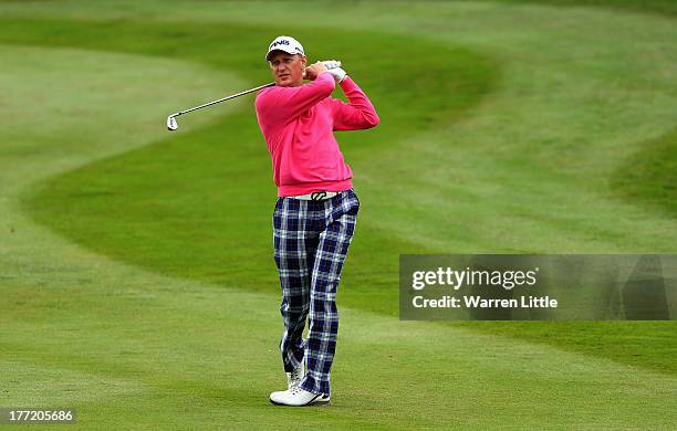 Simon Wakefield of England plays his second shot into the seventh green during the first round of the Johnnie Walker Championship at Gleneagles on...