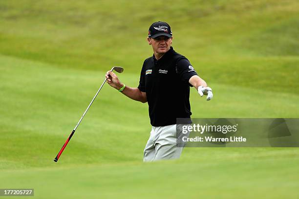 Paul Lawrie of Scotland in action during the first round of the Johnnie Walker Championship at Gleneagles on August 22, 2013 in Auchterarder,...