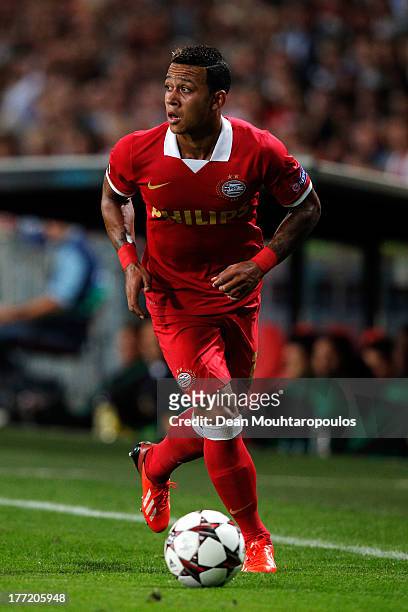 Memphis Depay of PSV in action during the UEFA Champions League Play-off First Leg match between PSV Eindhoven and AC Milan at PSV Stadion on August...
