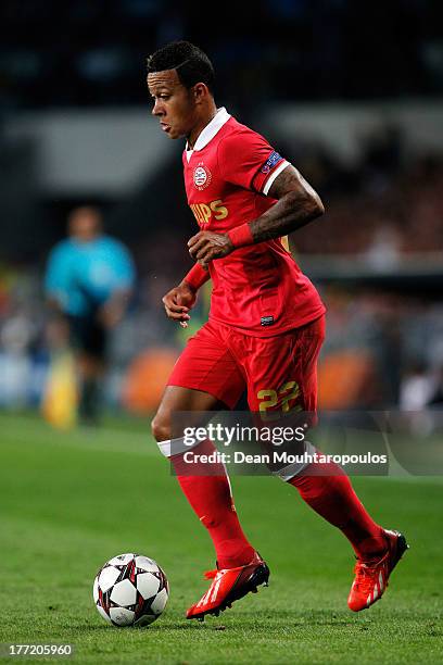 Memphis Depay of PSV in action during the UEFA Champions League Play-off First Leg match between PSV Eindhoven and AC Milan at PSV Stadion on August...