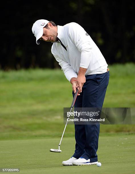 Francesco Molinari of Italy in action during the first round of the Johnnie Walker Championship at Gleneagles on August 22, 2013 in Auchterarder,...