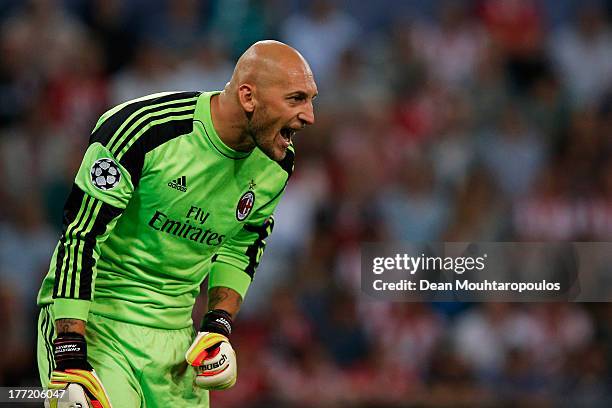 Goalkeeper, Christian Abbiati of AC Milan in action during the UEFA Champions League Play-off First Leg match between PSV Eindhoven and AC Milan at...