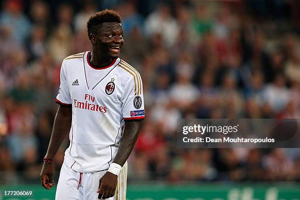 Sulley Muntari of AC Milan looks on during the UEFA Champions League Play-off First Leg match between PSV Eindhoven and AC Milan at PSV Stadion on...