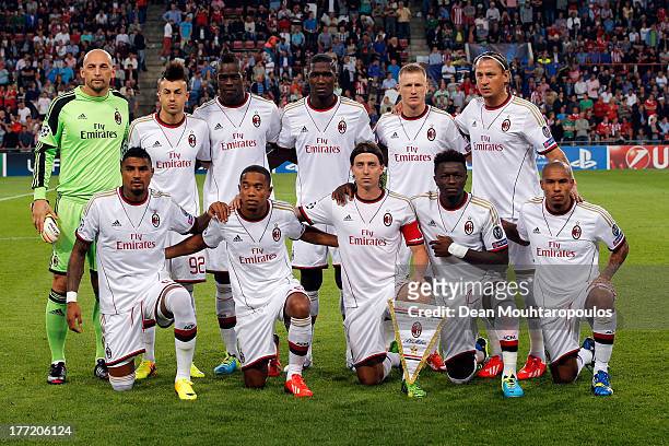 The AC Milan team line up prior to the UEFA Champions League Play-off First Leg match between PSV Eindhoven and AC Milan at PSV Stadion on August 20,...