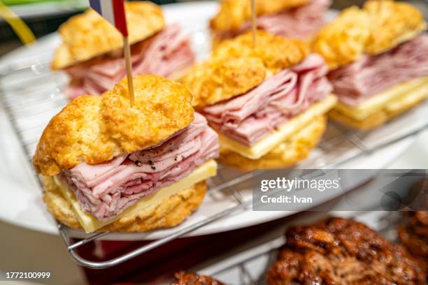 sausage and ham on cheese biscuits - prosciutto stock pictures, royalty-free photos & images