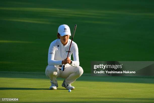 Yu Liu of China lines up a putt on the 18th green during the second round of the TOTO Japan Classic at the Taiheiyo Club's Minori Course on November...