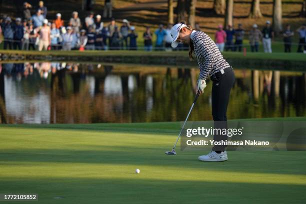 Mone Inami of Japan attempts a putt on the 18th green during the second round of the TOTO Japan Classic at the Taiheiyo Club's Minori Course on...