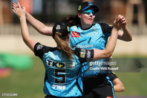 Annie O'Neil of the Strikers celebrates after taking the wicket of Ashleigh Gardner of the Sixers caught by Annie O'Neil of the Strikers during the...