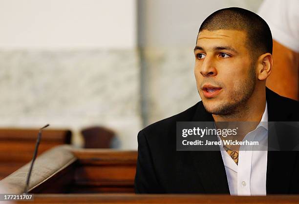 Aaron Hernandez sits in the courtroom of the Attleboro District Court during his hearing on August 22, 2013 in North Attleboro, Massachusetts. Former...
