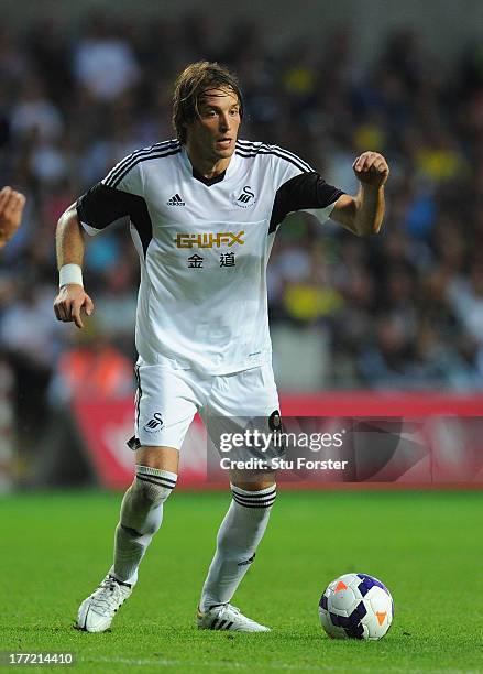 Swansea player Michu in action during the UEFA Europa League play-off first leg between Swansea City and FC Petrolul Ploiesti at Liberty Stadium on...