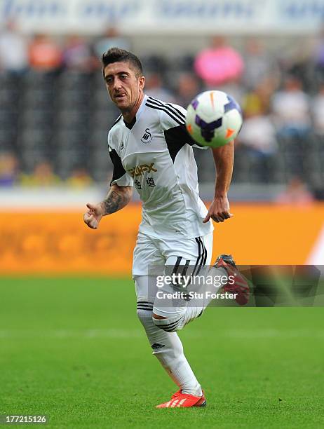 Swansea player Pablo Hernandez in action during the UEFA Europa League play-off first leg between Swansea City and FC Petrolul Ploiesti at Liberty...