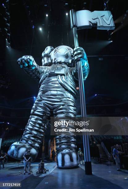 Moonman award designed by artist KAWS on display during a press conference for the 2013 MTV Video Music Awards at the Barclays Center on August 22,...