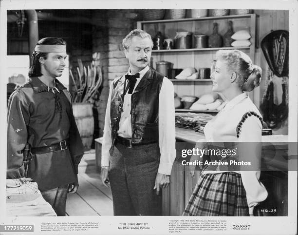 Actors Robert Young, Janis Carter, Jack Buetel, in a scene from the the movie 'Half Breed', 1952.