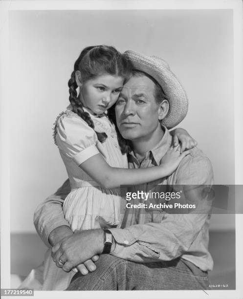 Promotional shot of actors Donna Corcoran and Ward Bond, as they appear in the movie 'Gypsy Colt', 1954.