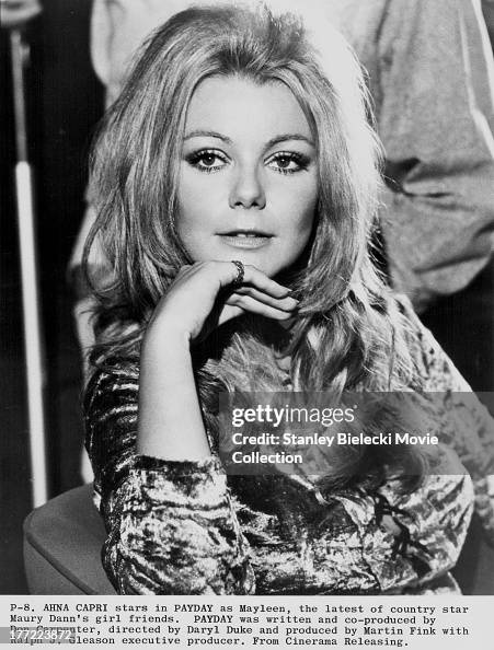 Promotional headshot of actress Ahna Capri, as she appears in the