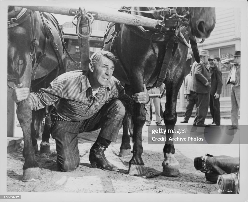 Actor Randy Tallman Actor Randolph Scott in a scene from the movie 'Tall Man Riding ...