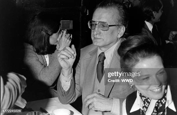 George C. Scott and Trish Van Devere attend an awards ceremony at Sardi's in New York City on January 30, 1977.