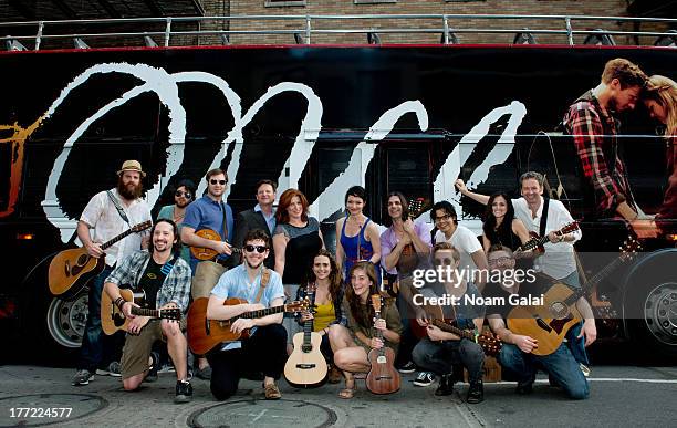 The cast of 'ONCE' perform in celebration of "ONCE Week" outside The Bernard B. Jacobs Theatre on August 22, 2013 in New York City.
