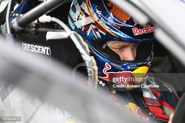 Casey Stoner driver of the Red Bull Pirtek Holden sits in his car prior to practice for round five of the V8 Supercars Dunlop Development Series at...