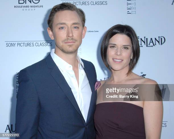 Actor J. J. Feild and actress Neve Campbell attend the premiere of 'Austenland' on August 8, 2013 at ArcLight Hollywood in Hollywood, California.