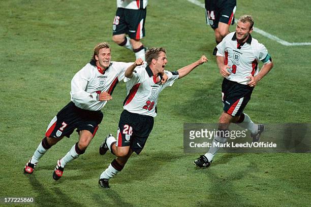 World Cup France '98 England v Romania , Michael Owen celebrates, after scoring England's equalising goal, with David Beckham and Alan Shearer.