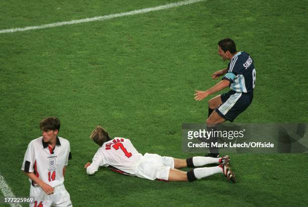 June 1998 - World Cup round of sixteen - Argentina v England, David Beckham aims a kick at Diego Simeone.