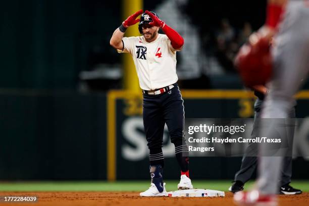 Robbie Grossman of the Texas Rangers celebrates during a game against the Minnesota Twins at Globe Life Field on September 01, 2023 in Arlington,...