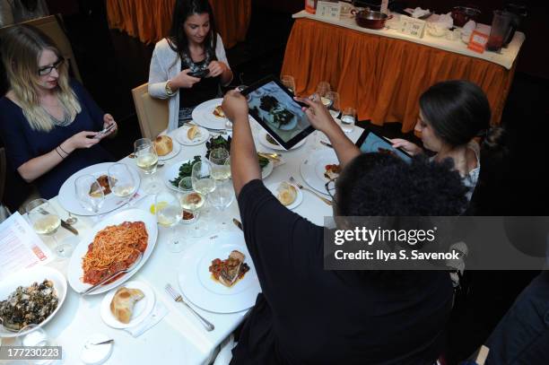 Shutterfly Photo Story for iPad dinner hosted by Rocco DiSpirito at SD26 on August 22, 2013 in New York City.