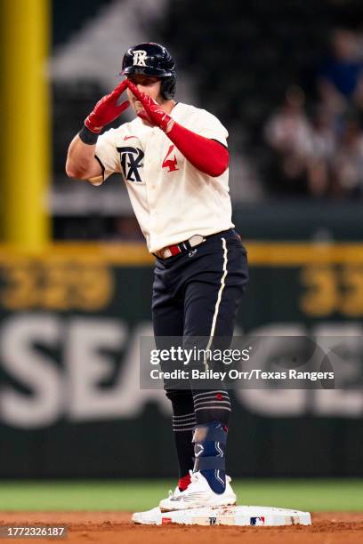 Robbie Grossman of the Texas Rangers celebrates during a game against the Minnesota Twins at Globe Life Field on September 02, 2023 in Arlington,...