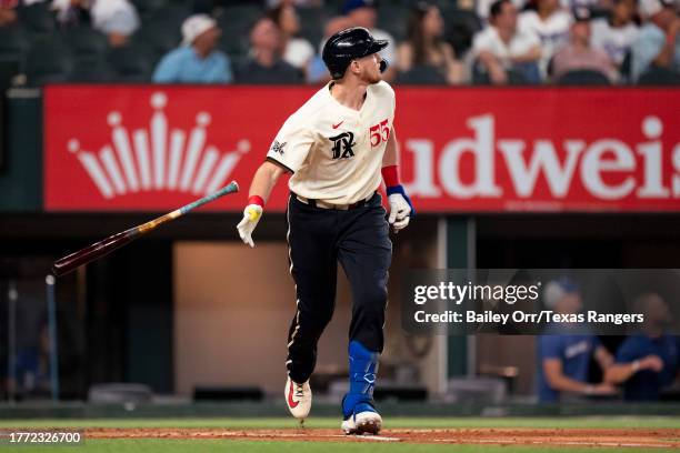 Sam Huff of the Texas Rangers flips his bat after hitting a home run during a game against the Minnesota Twins at Globe Life Field on September 02,...