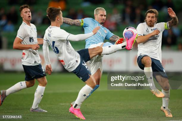 Jamie Maclaren of Melbourne City and Joel King of Sydney FC contest the ball during the A-League Men round three match between Melbourne City and...